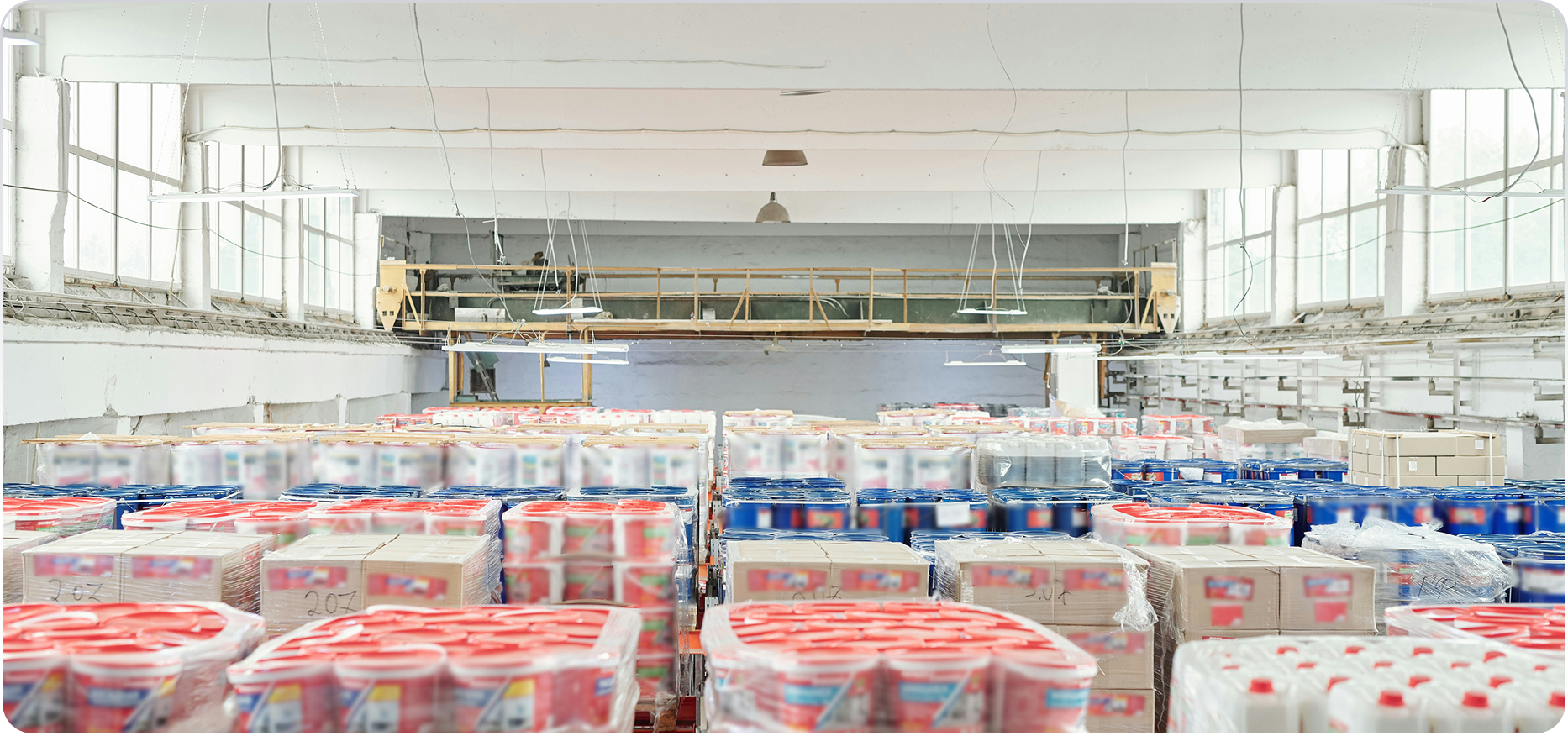 Beverage warehouse with pallets of drinks cases